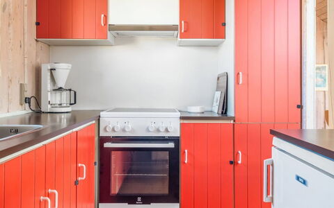 Eldmar - 500M from the Sea: Red, Kitchen, Wood, Cabinetry, Major Appliance, Kitchen Appliance, Cupboard, Countertop, Interior Design, Flooring