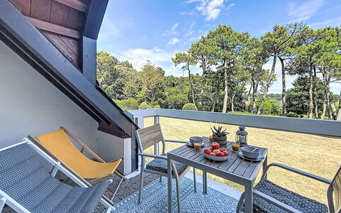 Les Terrasses du Port: Balcony, Deck, Shade, Chair, Outdoor Furniture, Handrail, Hardwood, Eco Hotel, Villa