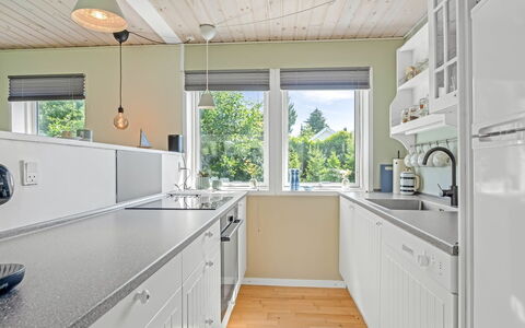 Gertraud - 600M from the Sea: Kitchen, Countertop, Interior Design, Flooring, Kitchen Appliance, Wood, Cabinetry, Ceiling, Major Appliance, Floor