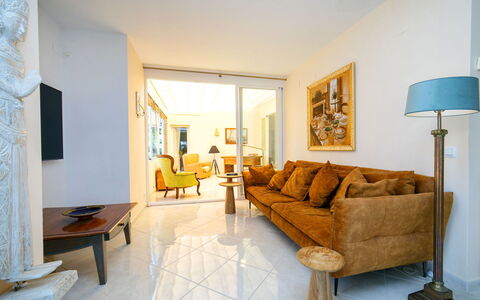 Castillo: Flooring, Furniture, Wall, Interior Design, Floor, Couch, Wood, Living Room, Ceiling, Home