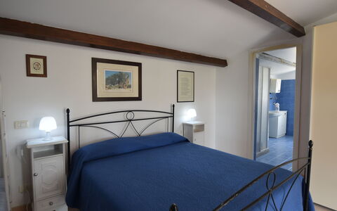 Le Vele della Contea: Furniture, Interior Design, Bed, Flooring, Bedroom, Floor, Room, Ceiling, Picture Frame, Bed Frame