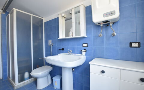 Le Vele della Contea: Flooring, Floor, Plumbing Fixture, Interior Design, Room, Sink, Plumbing, Tap, Bathroom, Bathroom Sink