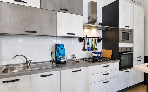 Villa Didymos: Kitchen, Kitchen Appliance, Countertop, Major Appliance, Interior Design, Flooring, Cabinetry, Kitchen Stove, Home Appliance, Furniture