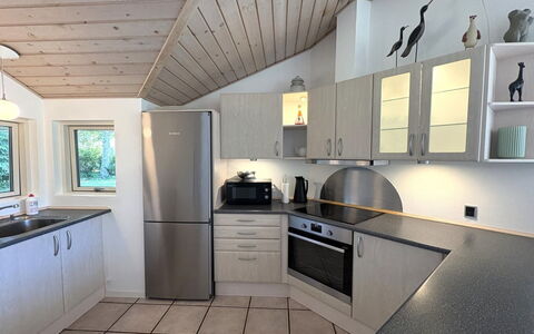 Veljan - 300M from the Sea: Kitchen, Countertop, Interior Design, Flooring, Cabinetry, Kitchen Appliance, Ceiling, Light Fixture, Major Appliance, Furniture