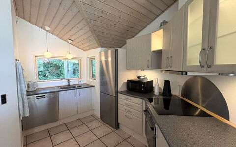 Veljan - 300M from the Sea: Kitchen, Countertop, Interior Design, Flooring, Ceiling, Wood, Major Appliance, Light Fixture, Kitchen Appliance, Cabinetry