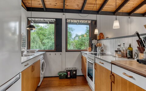 Thorunn - 250M from the Sea: Kitchen, Wood, Countertop, Major Appliance, Ceiling, Kitchen Appliance, Interior Design, Kitchen Stove, Flooring, Furniture