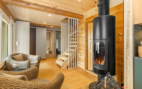 Villa Praava a: Flooring, Interior Design, Floor, Wood, Furniture, Wood Flooring, Ceiling, Room, Lighting, Living Room