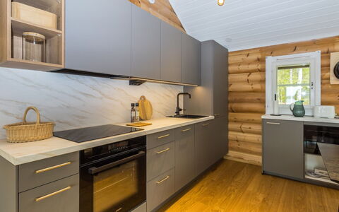 Villa Praava B: Flooring, Wood, Countertop, Interior Design, Kitchen, Cabinetry, Furniture, Kitchen Appliance, Floor, Wood Flooring