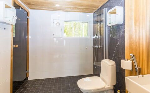 Villa Praava B: Flooring, Plumbing Fixture, Floor, Wood, Interior Design, Ceiling, Bathroom, Toilet, Bathroom Sink, Toilet Seat