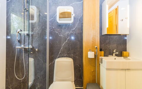 Villa Praava B: Wall, Flooring, Interior Design, Plumbing Fixture, Floor, Bathroom, Toilet, Bathroom Sink, Toilet Seat, Ceiling