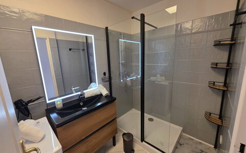 Villa Norma: Flooring, Floor, Interior Design, Plumbing Fixture, Bathroom Cabinet, Plumbing, Bathroom, Room, Mirror, Tile