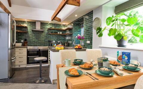 Leetor: Furniture, Kitchen, Interior Design, Countertop, Flooring, Wall, Wood, Kitchen Appliance, Ceiling, Cabinetry