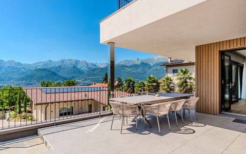 Aura: Home, Balcony, Porch, Mountain Range, Shade, Eco Hotel, Deck, Chair, Wood Flooring, Villa