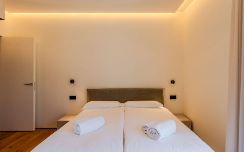 Aura: Interior Design, Ceiling, Floor, Flooring, Room, Lighting, Bedroom, Bed, Bed Frame, Apartment