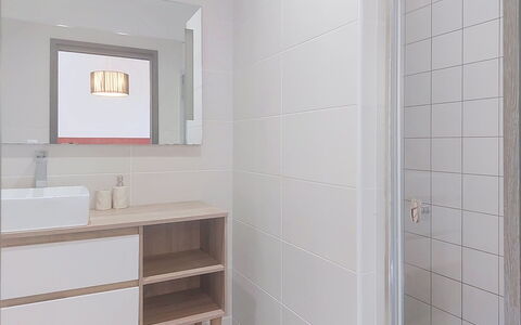 E Follicie: Flooring, Wall, Floor, Interior Design, Plumbing Fixture, Bathroom Cabinet, Bathroom, Mirror, Bathroom Sink, Plumbing