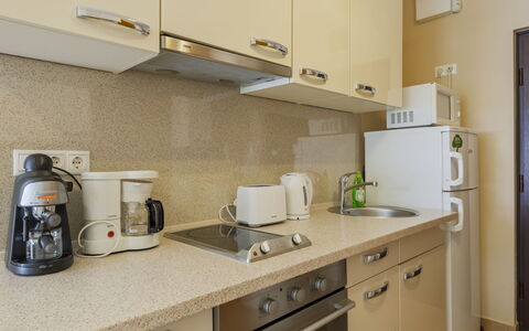 Patti: Kitchen Appliance, Countertop, Cabinetry, Major Appliance, Kitchen, Interior Design, Small Appliance, Furniture, Flooring, Sink
