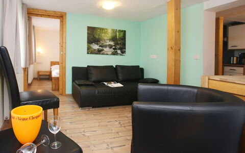 Zell am See 79: Furniture, Interior Design, Flooring, Ceiling, Wood, Floor, Couch, Room, Living Room, Lighting