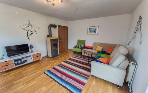 Haus Valentin: Furniture, Flooring, Floor, Interior Design, Wood, Couch, Room, Living Room, Wood Flooring, Lighting