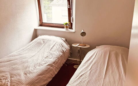 Eifelhuis im Salmtal: Bed, Bedroom, Floor, Wall, Bed Sheet, Wood, Bedding, Flooring, Linens, Interior Design