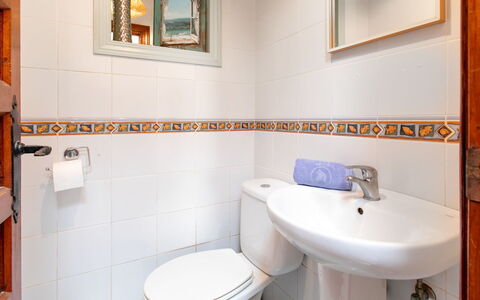 Carmen: Plumbing Fixture, Bathroom, Flooring, Toilet Seat, Floor, Interior Design, Toilet, Plumbing, Sink, Tile