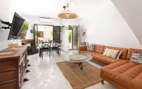 Carmen: Furniture, Interior Design, Flooring, Wall, Floor, Couch, Wood, Living Room, Table, Room