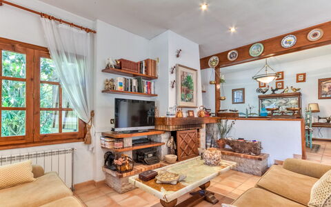 Quietud: Furniture, Interior Design, Wood, Couch, Flooring, Living Room, Room, Table, Ceiling, Floor