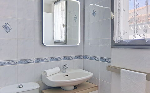 Les Dunes: Plumbing Fixture, Sink, Bathroom Sink, Bathroom, Tap, Plumbing, Tile, Porcelain, Ceramic, Mirror
