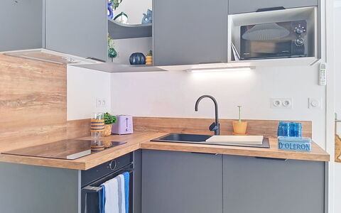 Les Bains D'Oléron 1: Kitchen, Kitchen Appliance, Countertop, Furniture, Cabinetry, Interior Design, Wood, Major Appliance, Flooring, Home Appliance