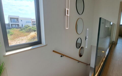 Val: Interior Design, Furniture, Wood, Flooring, Ceiling, Floor, Room, Lighting, Apartment, Table