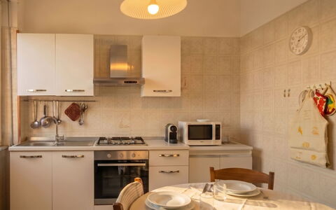Vela Latina: Interior Design, Furniture, Wood, Flooring, Ceiling, Floor, Room, Lighting, Apartment, Table