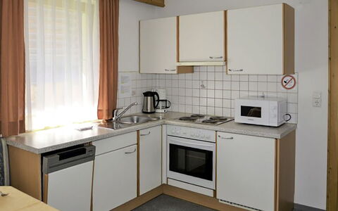 Kappl 327: Furniture, Interior Design, Wood, Flooring, Room, Floor, Kitchen, Lighting, Curtain, Chair