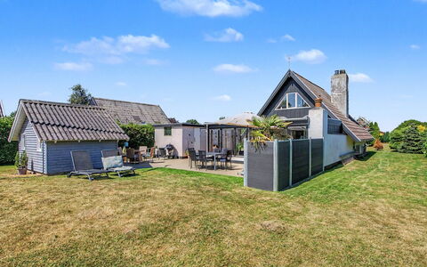 Rosalie - 150M from the Sea: Sky, Grass, Roof, House, Home, Cottage, Residential Area, Architecture, Shrub