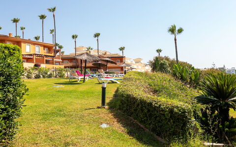 Urbanización Bermuda Beach: Blue, Residential Area, Apartment, Condominium, Resort, Balcony, Estate, Lawn, Swimming Pool, Hotel