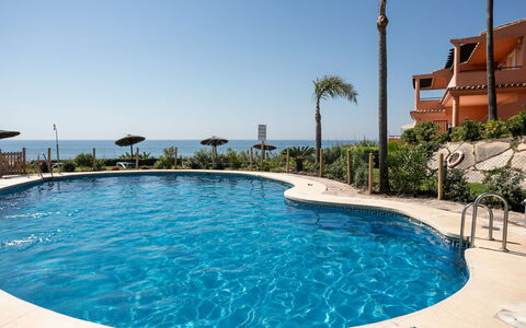Urbanización Bermuda Beach: Blue, Residential Area, Apartment, Condominium, Resort, Balcony, Estate, Lawn, Swimming Pool, Hotel