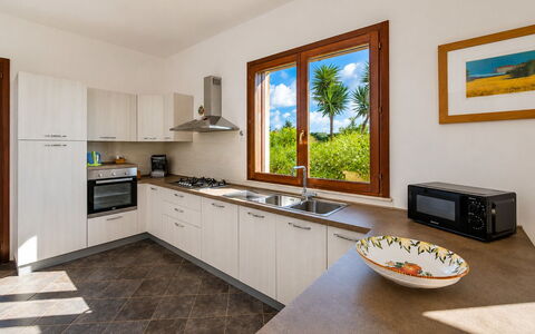 Villa Don Pino: Kitchen, Countertop, Interior Design, Flooring, Wood, Kitchen Appliance, Home, Room, Cabinetry, Furniture