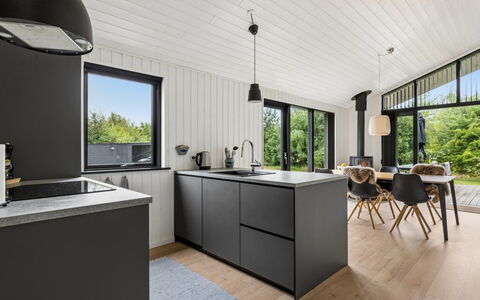 Pertti - 750M from the Sea: Kitchen, Countertop, Wood, Interior Design, Furniture, Kitchen Appliance, Ceiling, Cabinetry, Flooring, Tap