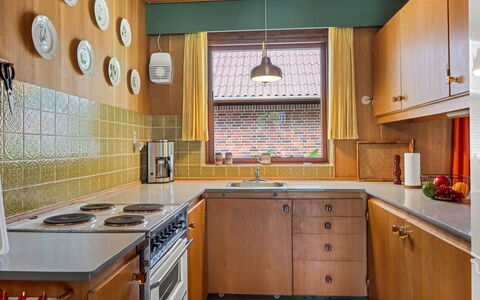 Milly - 500M to the Fjord: Kitchen, Countertop, Interior Design, Wood, Cabinetry, Flooring, Ceiling, Kitchen Appliance, Major Appliance, Kitchen Sink