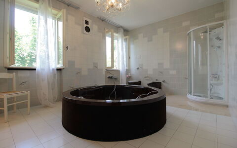 Villa Eva: Bathtub, Flooring, Interior Design, Floor, Plumbing Fixture, Bathroom, Plumbing, Lighting, Ceiling, Room