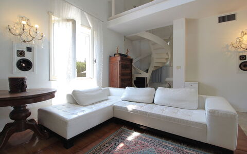 Villa Eva: Furniture, Interior Design, Flooring, Couch, Floor, Wall, Wood, Living Room, Wood Flooring, Room