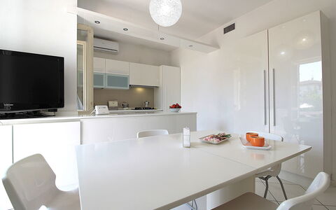 Villa Eva: Furniture, Interior Design, Wall, Flooring, Kitchen, Ceiling, Kitchen Appliance, Countertop, Lighting, Light Fixture