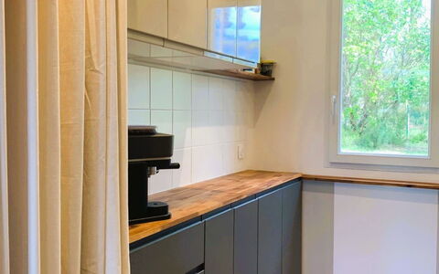 Allée des Dunes: Interior Design, Flooring, Wood, Cabinetry, Floor, Kitchen, Countertop, Kitchen Appliance, Furniture, Lighting