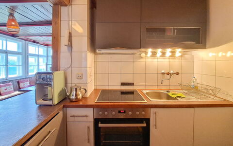 Grafenast: Kitchen, Kitchen Appliance, Countertop, Major Appliance, Kitchen Sink, Cabinetry, Flooring, Wood, Interior Design, Sink