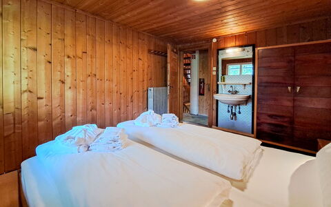 Grafenast: Bed, Bedroom, Interior Design, Flooring, Floor, Wood, Ceiling, Bed Sheet, Bedding, Furniture