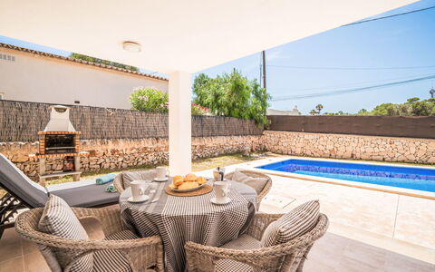 Garlanda: Swimming Pool, Flooring, Floor, Furniture, Resort, Outdoor Furniture, Composite Material, Chair, Shade, Tile