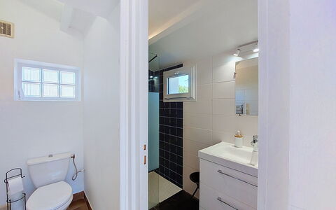 Villa la Coquille: Bathroom, Plumbing Fixture, Flooring, Interior Design, Floor, Bathroom Sink, Sink, Toilet, Ceiling, Tap