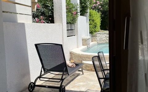 Volme: Furniture, Floor, Flooring, Outdoor Furniture, Chair, Shade, Flowerpot, Houseplant, Wood Stain, Balcony