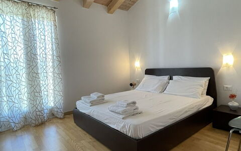 Volme: Flooring, Interior Design, Floor, Wood, Ceiling, Furniture, Room, Lighting, Bed, Bedroom