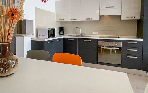 Volme: Furniture, Interior Design, Flooring, Kitchen, Countertop, Wood, Floor, Ceiling, Kitchen Appliance, Cabinetry
