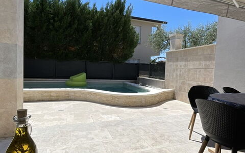 Monte Kope: Shade, Outdoor Furniture, Chair, Umbrella, Outdoor Structure, Canopy, Swimming Pool, Tile, Outdoor Table, Awning