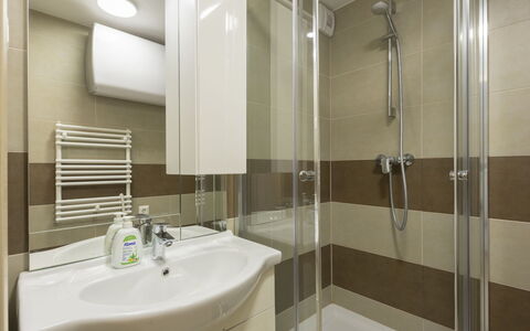 Silver: Flooring, Wall, Interior Design, Floor, Plumbing Fixture, Bathroom, Toilet, Room, Sink, Bathroom Sink